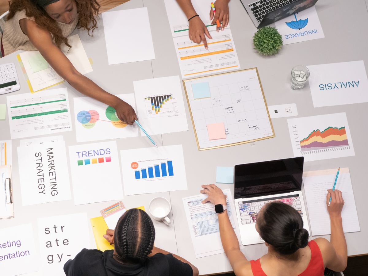 African business team consulting on web hosting upgrade decision in Kenya